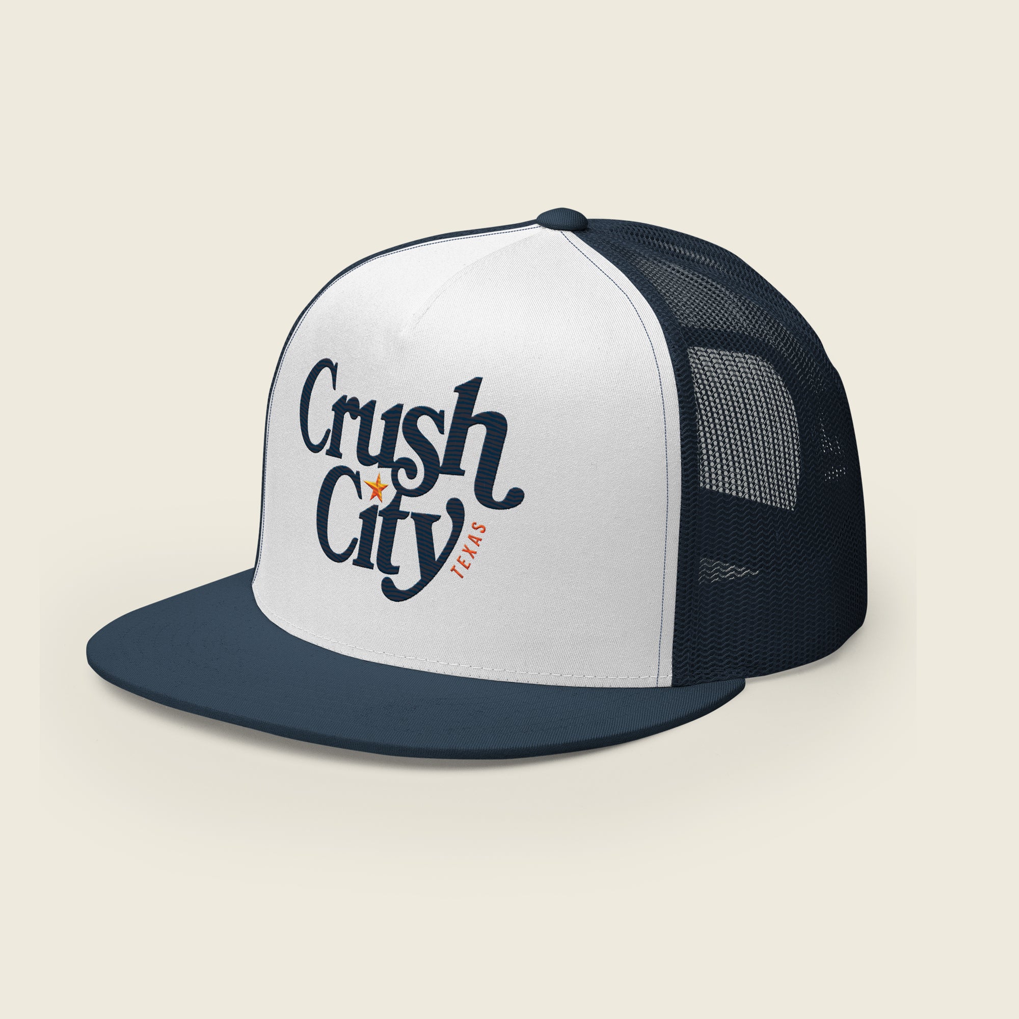 Navy and white trucker-style snapback hat with a white front panel featuring the text “Crush City” in bold navy script, a small orange star between the words, and “Texas” in orange lettering along the side.
