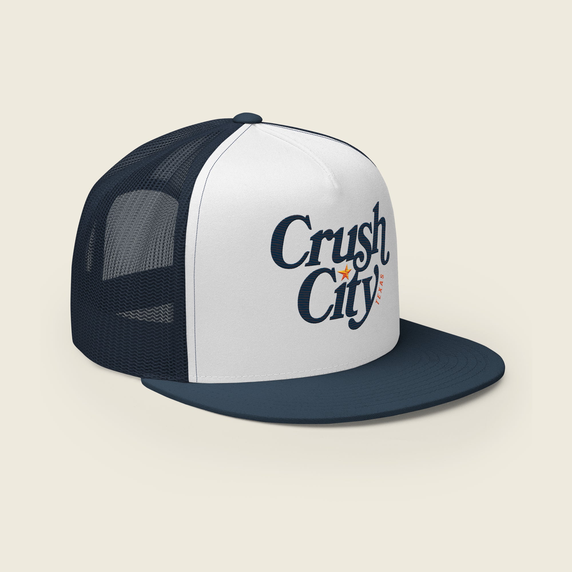 Navy and white trucker-style snapback hat with a white front panel featuring the text “Crush City” in bold navy script, a small orange star between the words, and “Texas” in orange lettering along the side.