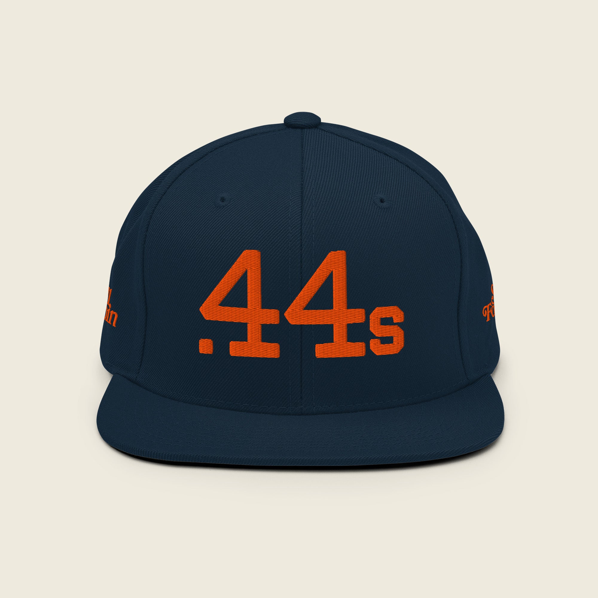Navy Houston .44s snapback hat with bold orange embroidered front logo inspired by Houston baseball culture.