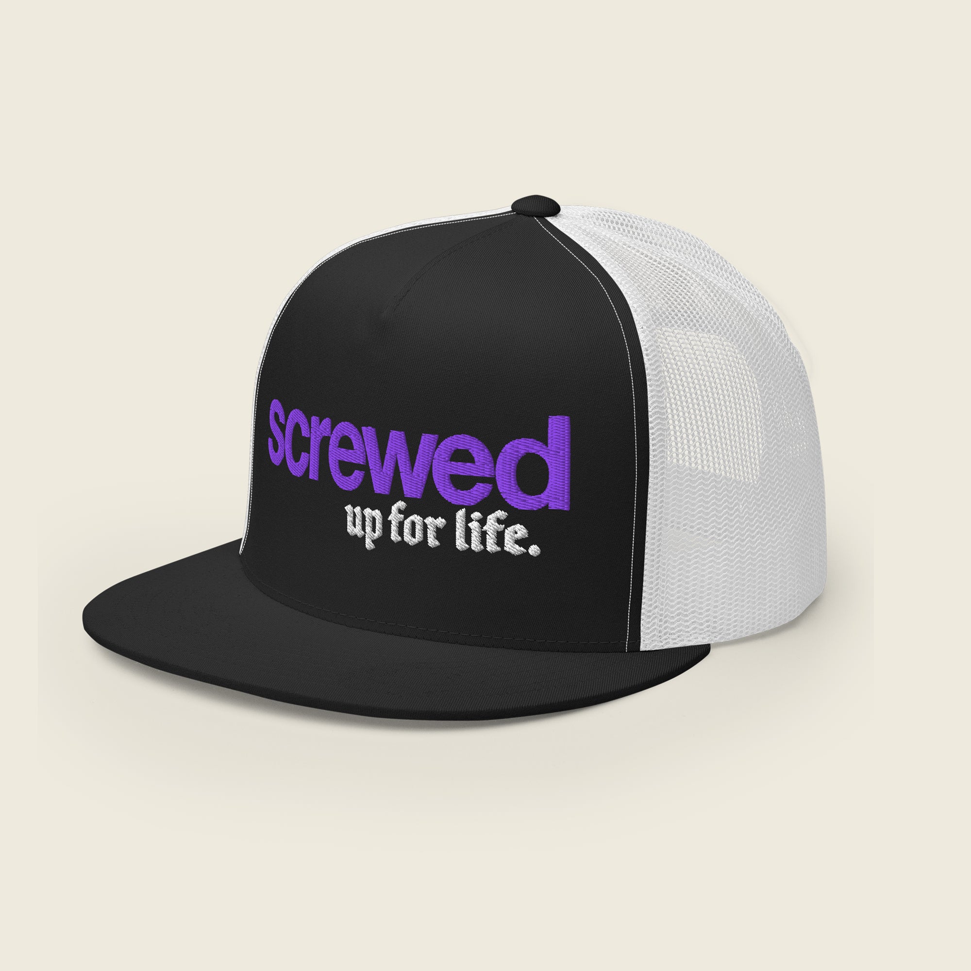 A black and white trucker snapback hat with a flat brim. The front panel features embroidered text in two styles: the word "screwed" in bold purple lowercase letters, and the phrase "up for life." in white Old English-style font beneath it. The mesh back of the hat is white, while the front and brim are black.