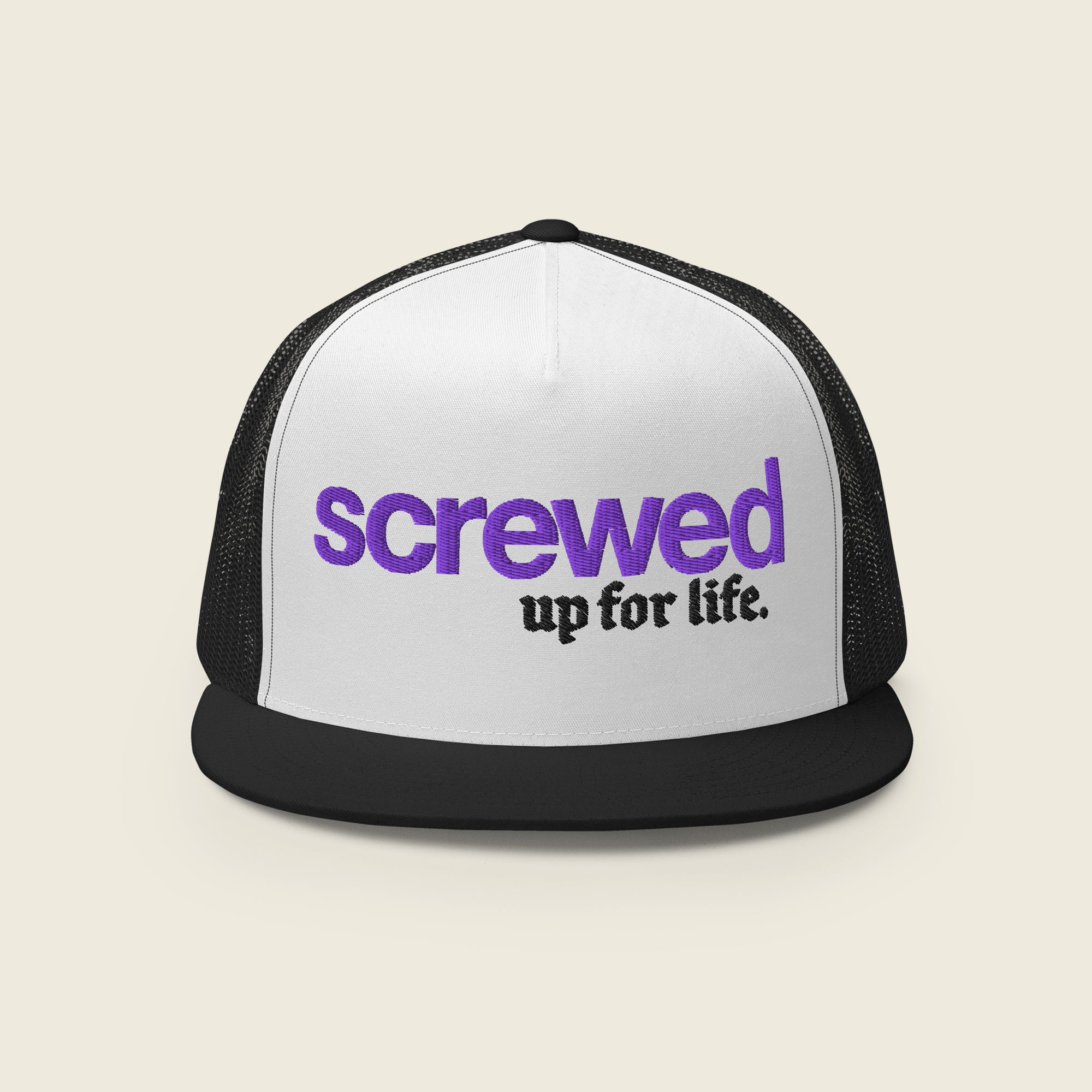 A white and black trucker snapback hat with a flat brim. The front panel features embroidered text in two styles: the word "screwed" in bold purple lowercase letters, and the phrase "up for life." in black Old English-style font beneath it. The mesh back of the hat is black, while the front is white with a black brim.
