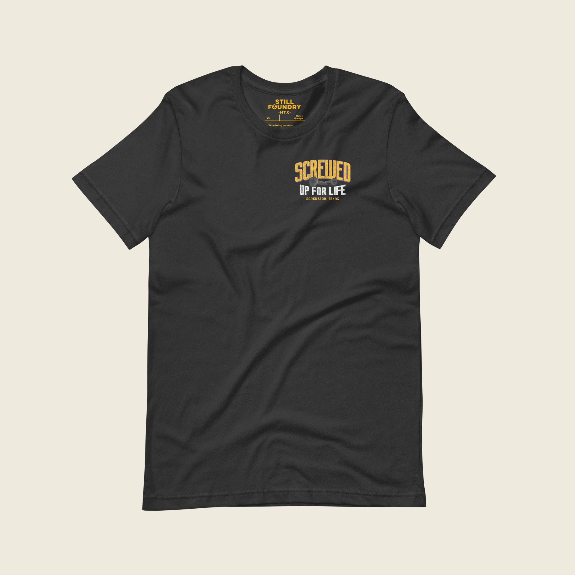 Front of dark gray Houston streetwear T-shirt with small “Screwed Up For Life – Screwtown Texas” chest graphic.